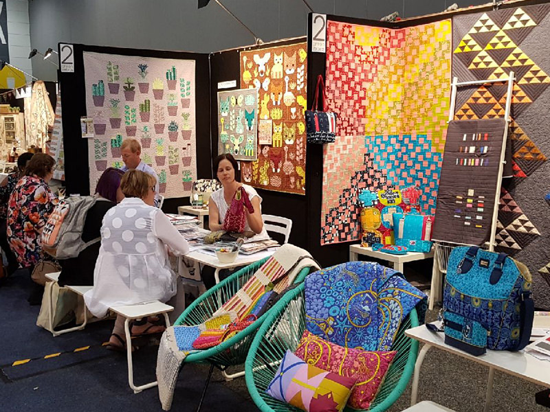 Lisa doing business at AQM 2017 - Andrie Designs