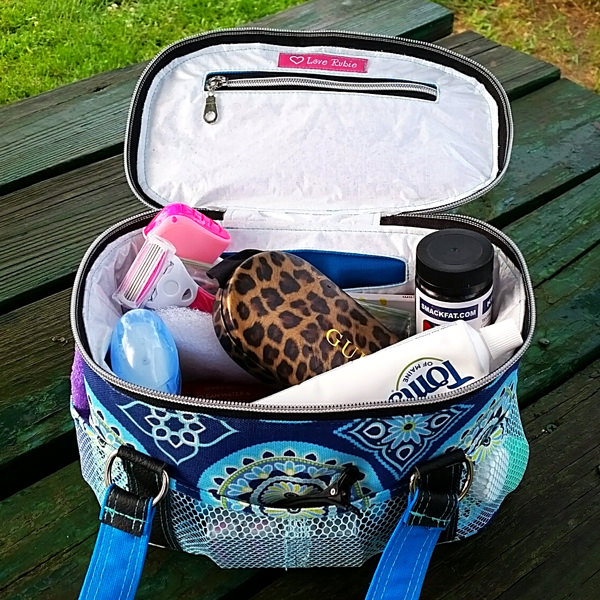 Inventive use of Command Shower Caddy: purse kit