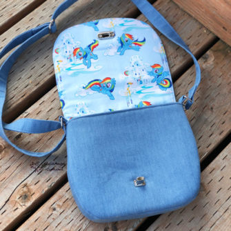 Open view of the 'rainbow' motif That Flap Saddlebag - Andrie Designs